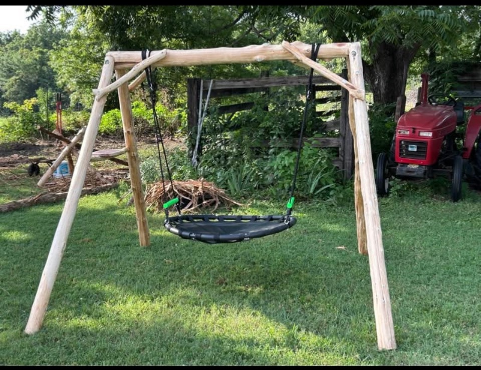 Handcrafted cedar swing set with nest swing